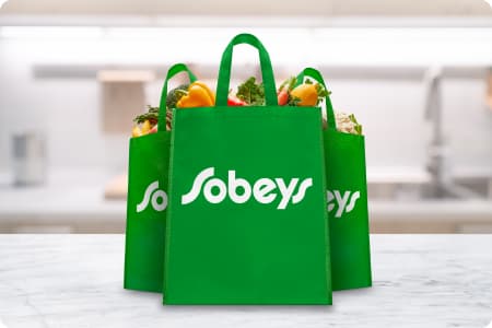 Modern recycled grocery bags with Sobeys logo on them