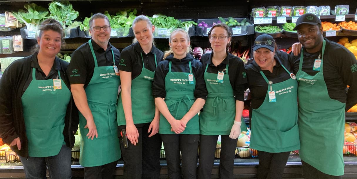 Sobeys employees laughing and posing for a picture together